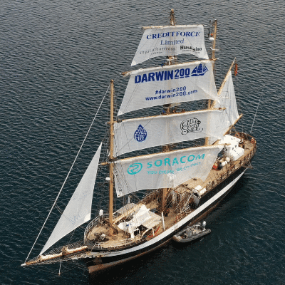 Darwin boat with logos