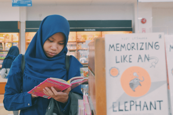 Young girl reading a book